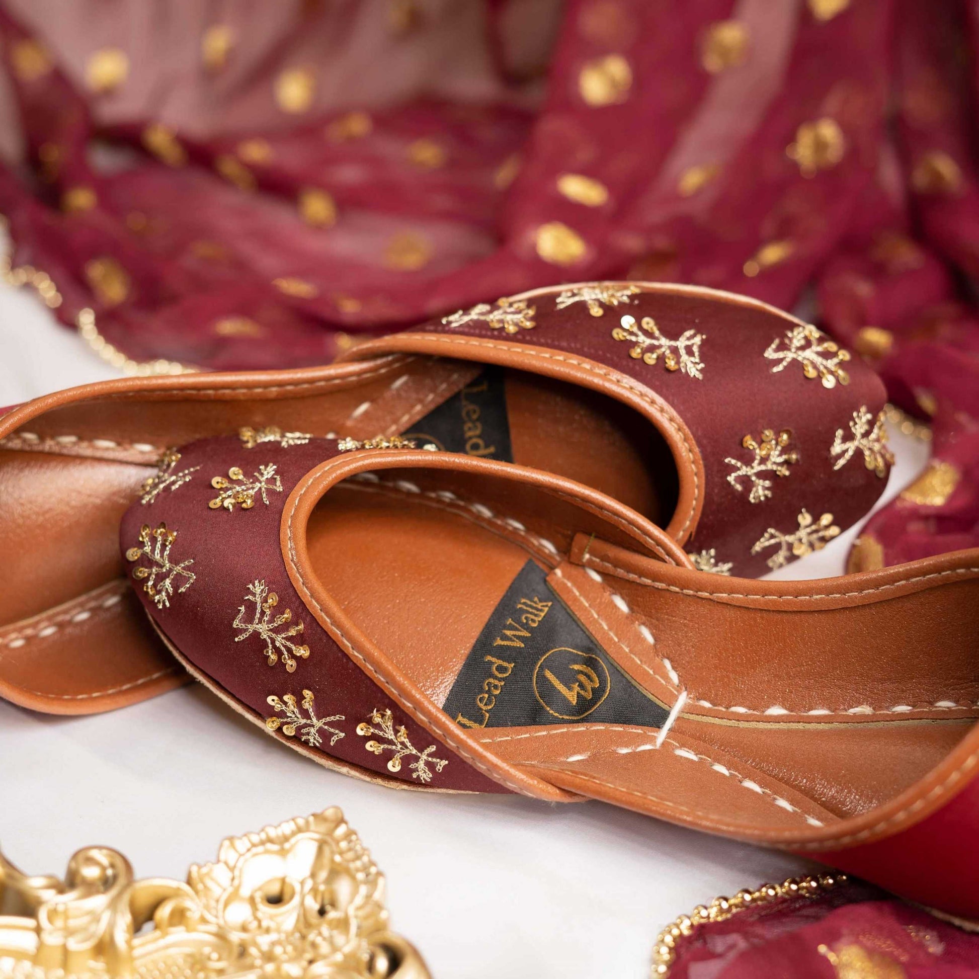 Ashiyana – Deep Maroon Jutti with Golden Zari & Sequins