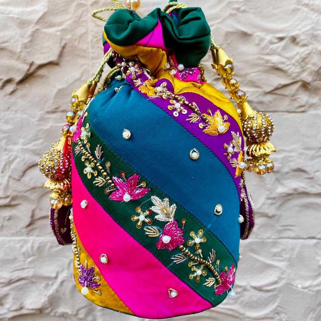 Kiran Chattapatti – Multi‑Tone Silk Potli with Beadwork & Tassels